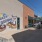 outdoor patio with painting on a building