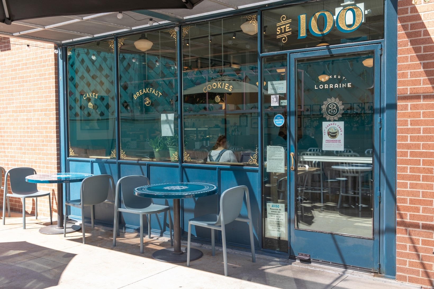 Bakery Lorraine a front door with windows with a patio outside