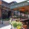outdoor patio with covering and chairs and tables