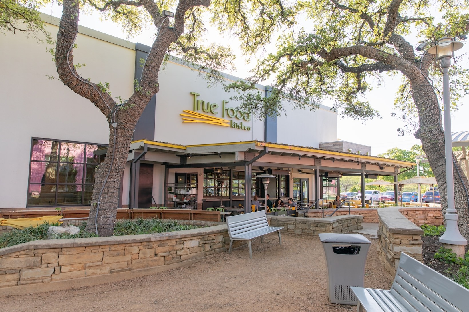 True Food Kitchen outdoor entrance with many windows and a sign