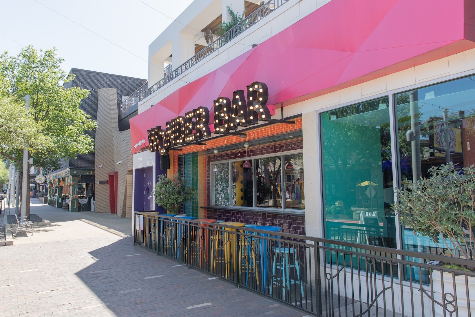 Wonder Bar outdoor patio with stools and high-top tables
