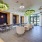 clubhouse lobby with tables, chairs and booths