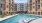 in-pool loungers on tanning ledge with fountains